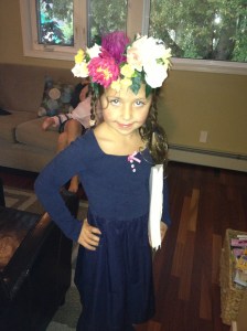 Shorty #1 selects some Coachella inspired headgear for her first day back to school.