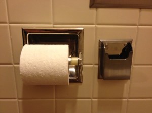 Something every busy working woman needs.  A place to put your phone when you pee....